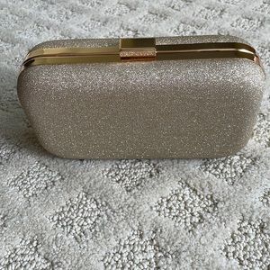 Ann Taylor gold/silver glitter clutch. Like new!
